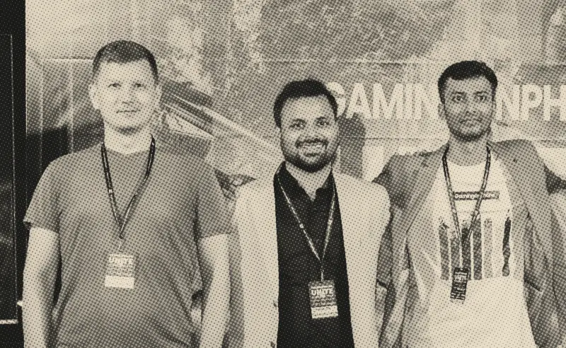 Ilia with fellow attendees at an industry event